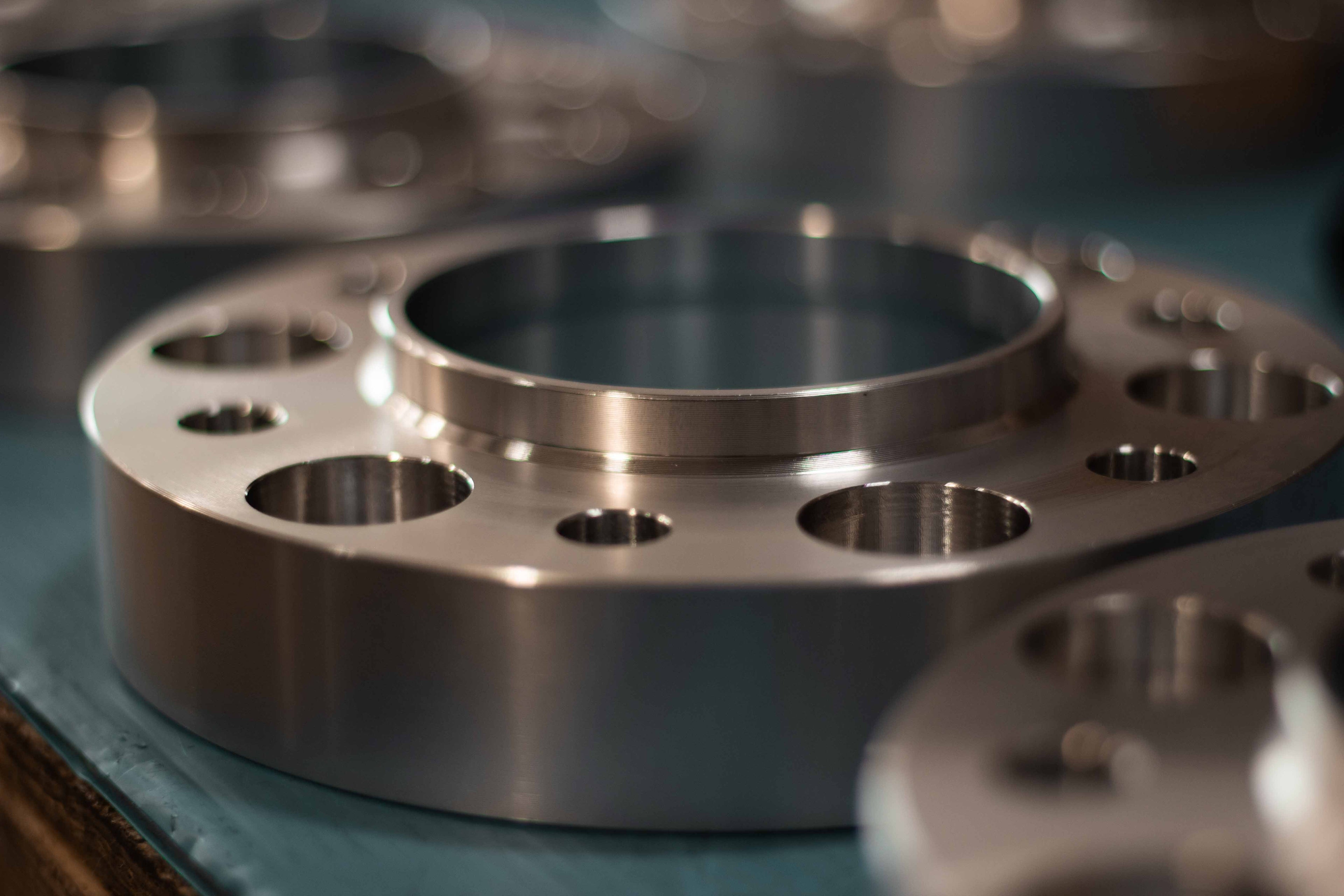 Close-up of a CNC-machined billet aluminum wheel spacer manufactured by BSB USA.